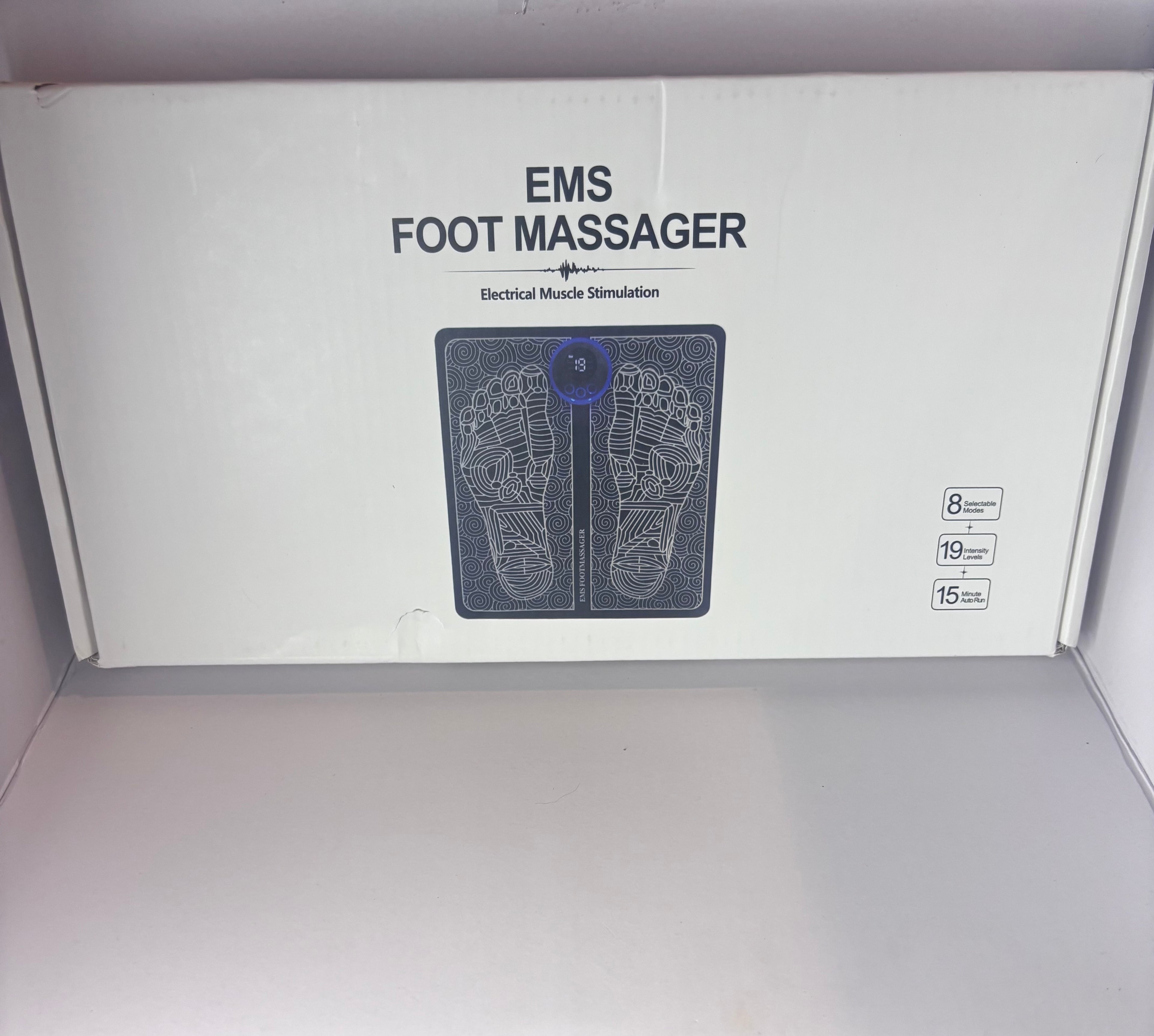 Electrical Muscle Stimulation (EMS) foot massager mat