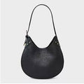 Universal Thread curved shoulder bag with metallic button detailing.