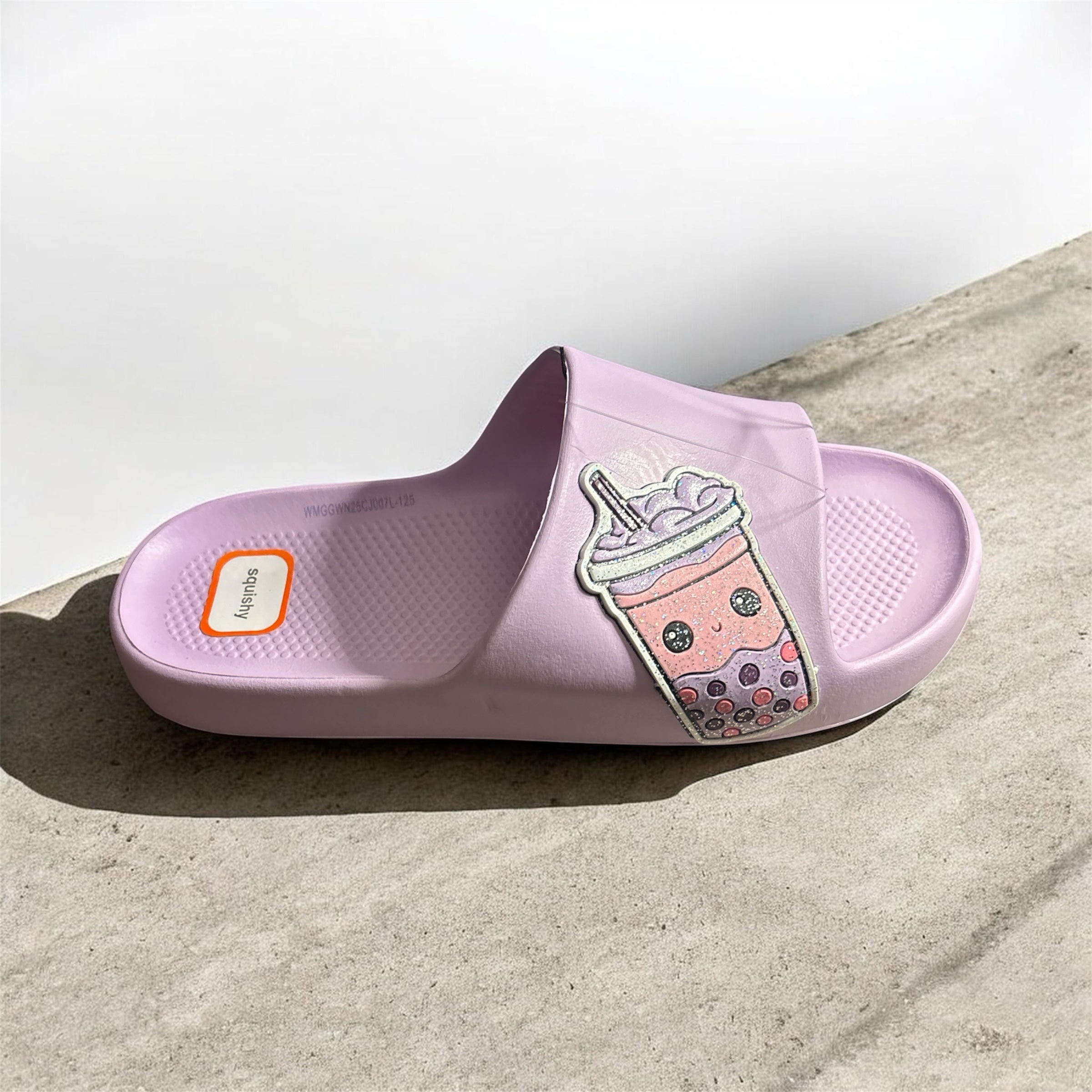 Premier Fusion by Jalinity LLC lavender slide sandals with a cute boba tea patch on a soft recycled EVA footbed.